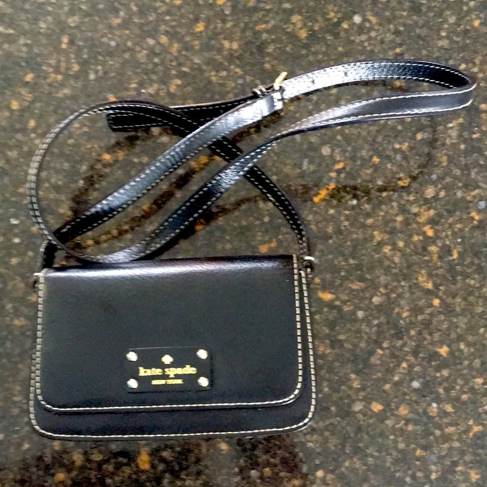 Lovely, Mint condition black leather Kate Spade crossbody purse.